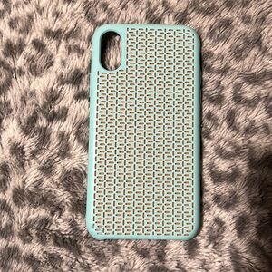 Used iPhone XS case. Teal with pink/orange undertone